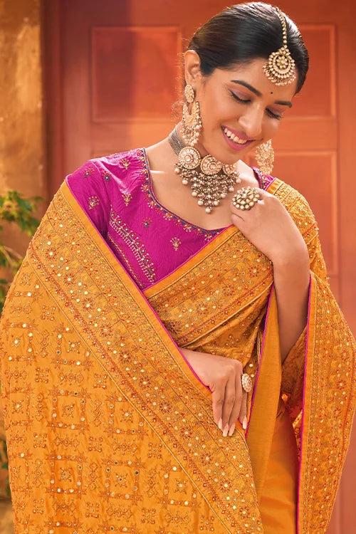 Fascinating Yellow Banarasi Silk With Diamond Heavy Mirror Work Saree With Blouse