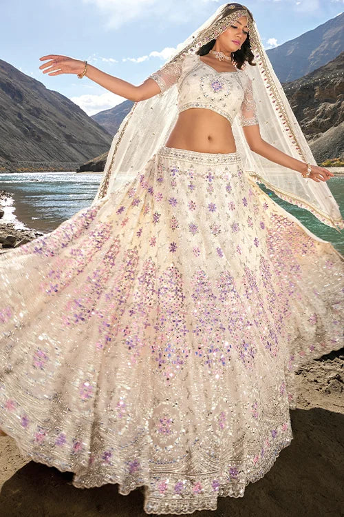 Enchanting Cream Mirror Work Zarkan Sequins Work Lehenga Choli With Dupatta