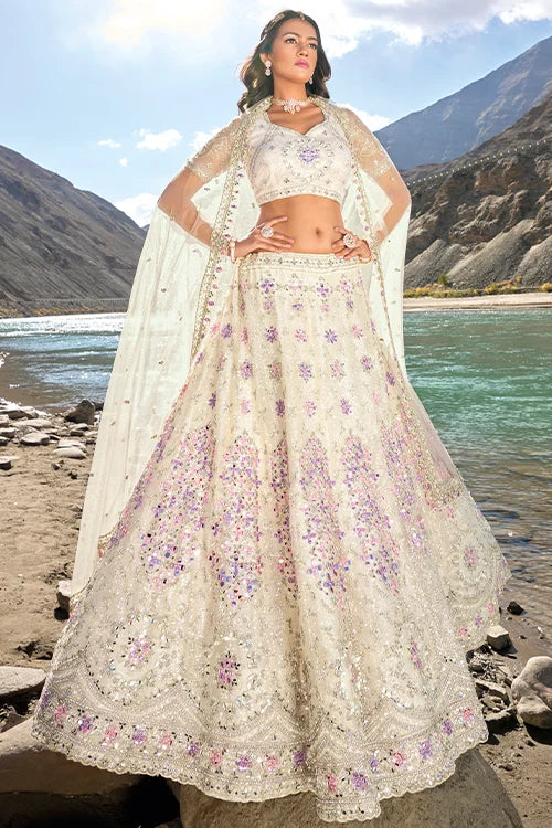 Enchanting Cream Mirror Work Zarkan Sequins Work Lehenga Choli With Dupatta