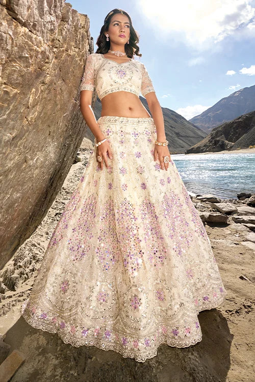 Enchanting Cream Mirror Work Zarkan Sequins Work Lehenga Choli With Dupatta
