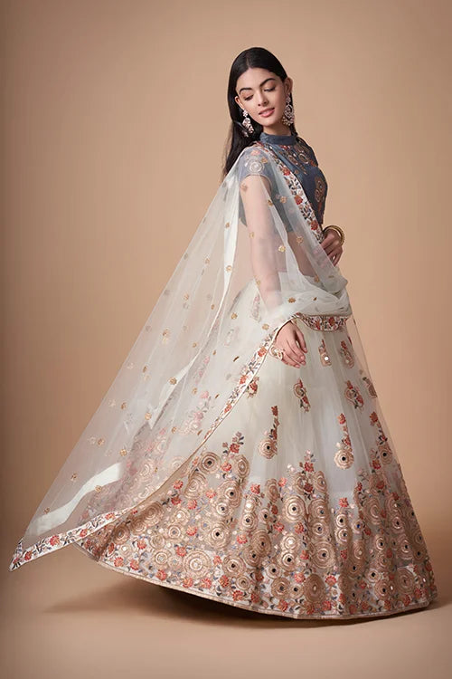 Embroidered Enchantment in Mirror Work Lehenga Choli Couture