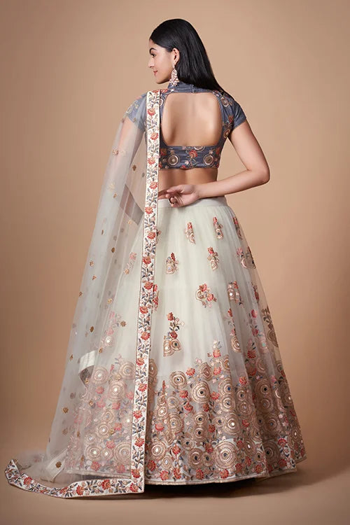 Embroidered Enchantment in Mirror Work Lehenga Choli Couture