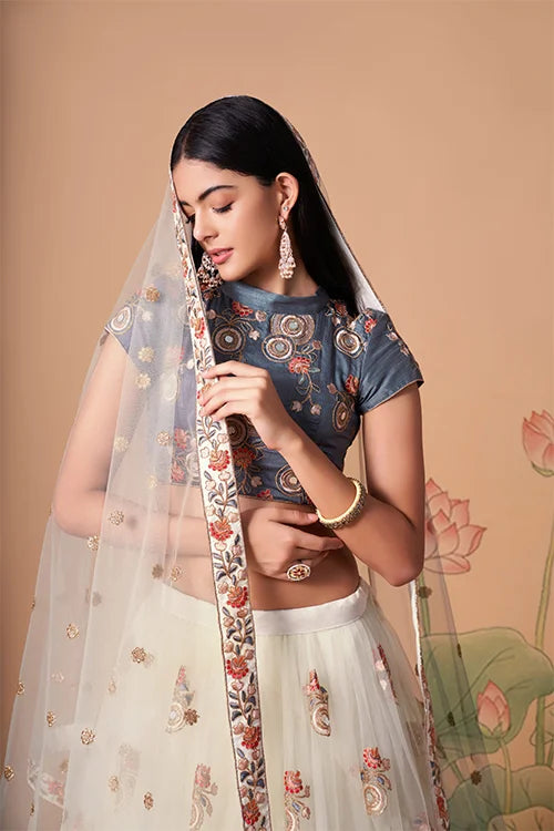 Embroidered Enchantment in Mirror Work Lehenga Choli Couture