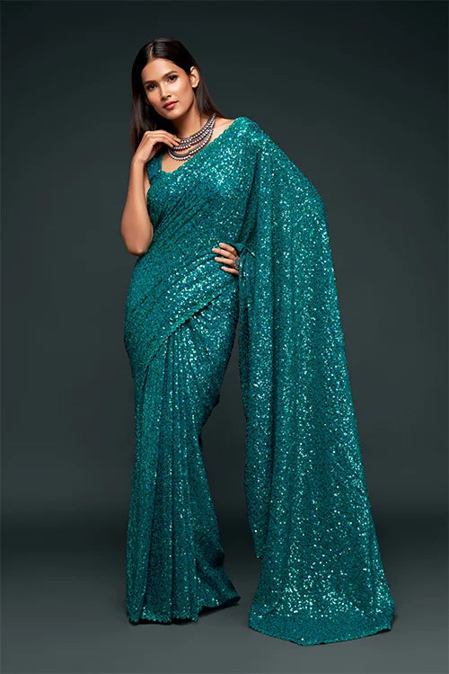 Stunning Teal Blue Sequins Georgette Festival Wear Saree With Blouse
