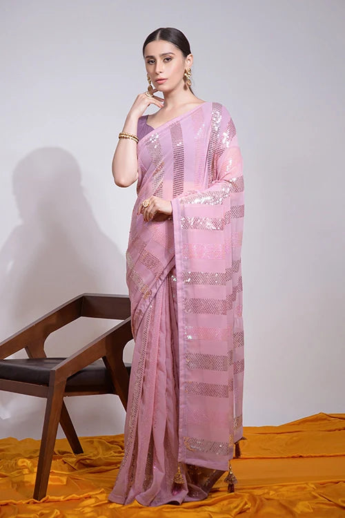 Stylish Peach Heavy Georgette Saree for Special Occasions