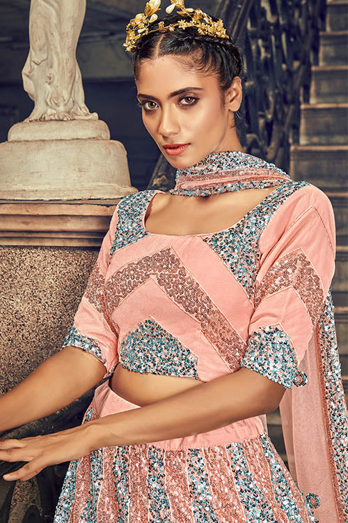 Peach Exclusive Sequins Embroidered Wholesale Lehenga Choli