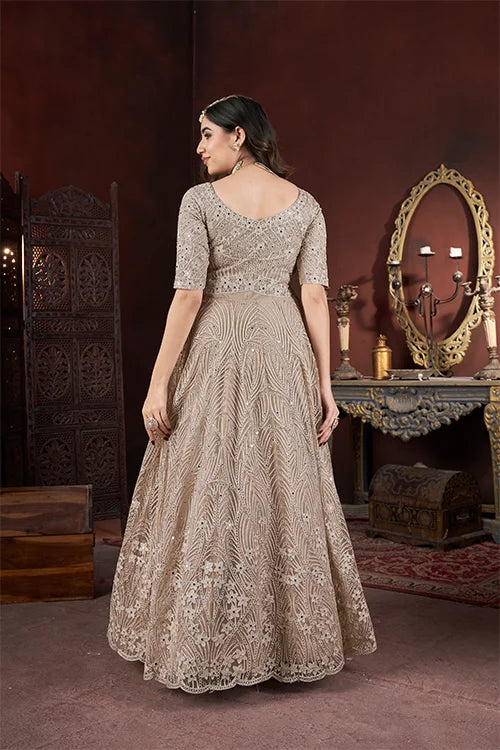 Beautiful Chiku Embroidered Net Reception Wear Gown With Dupatta