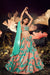 Turquoise Orange Velvet Sequins Embroidery Work Lehenga Choli